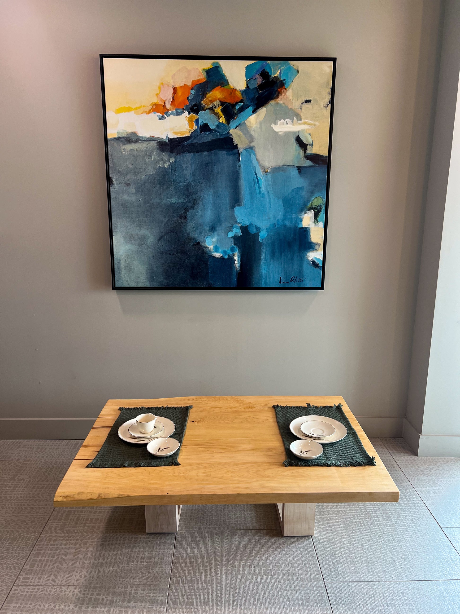 Handcrafted Japanese floor table made from solid wood with a live edge design. A low dining table perfect for tea, family meals, or modern spaces. Sustainable, custom-made furniture from Austin, Texas with timeless artisan style.